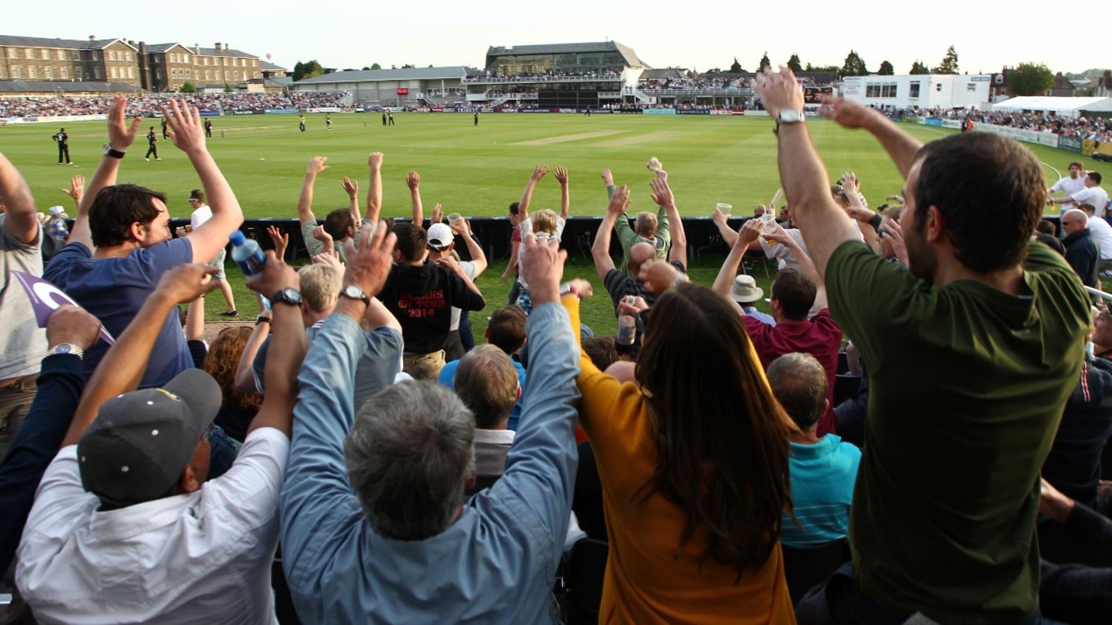 Fans cheer at Bristol County Ground with fans